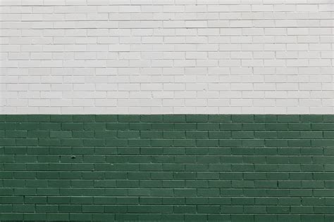 Download White And Green Brick Wall Wallpaper | Wallpapers.com