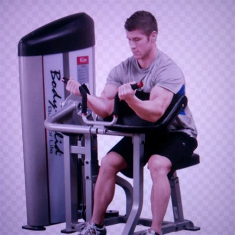 Image result for Bicep Curl Machine Exercise