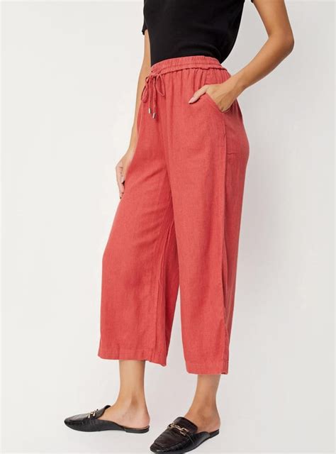 Buy Women Solid Woven Relaxed Fit Trousers Online at just Rs. 999.0 ...