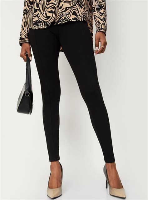 Buy Women Solid Stretch Knit Treggings Online at just Rs. 899.0 ...