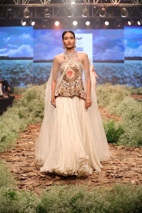 Embroidered corset with pleated skirt & cape – samantchauhan