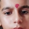 b) The power of his eyes was considerably enhanced by their position ...
