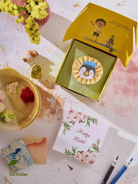 Penguin with a Blue Beret Plantable Seed Paper Rakhi Combo