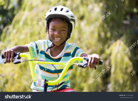 Kid riding bike Images, Stock Photos & Vectors | Shutterstock