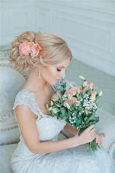 Bridal Updos With Flower by 20 Most Beautiful Updo Wedding Hairstyles To Inspire You Bridal Updos With Flower