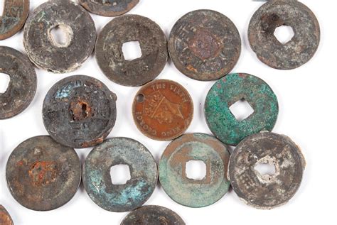 Lot - FORTY-SIX ANTIQUE CHINESE COINS