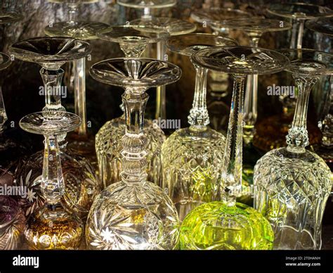 Lead crystal glasses, wine glasses, champagne glasses, colourful in old ...