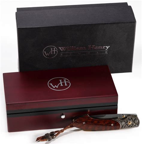 #556: WILLIAM HENRY SNAKEWOOD SIDED FOLDING KNIFE IN BOX