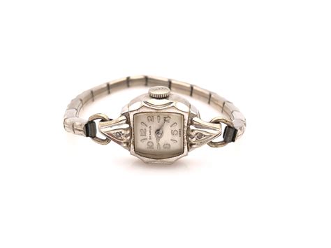 Lot - 10K GOLD BENRUS ANTIQUE WATCH WITH DIAMONDS