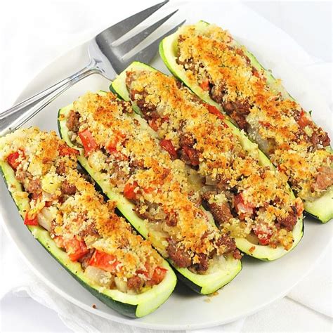 Stuffed Zucchini Boats With Sausage and Tomatoes • Now Cook This!