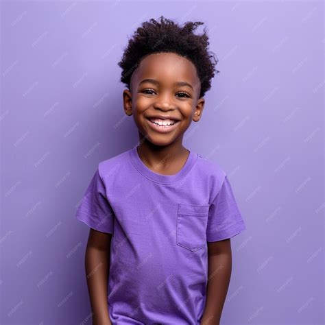 Premium Photo | A boy wearing a purple shirt that says hes smiling