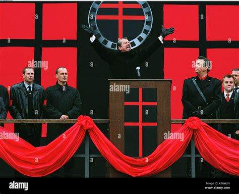 V FOR VENDETTA JOHN HURT as Adam Sutler (center) , ROGER ALLAM Date ...