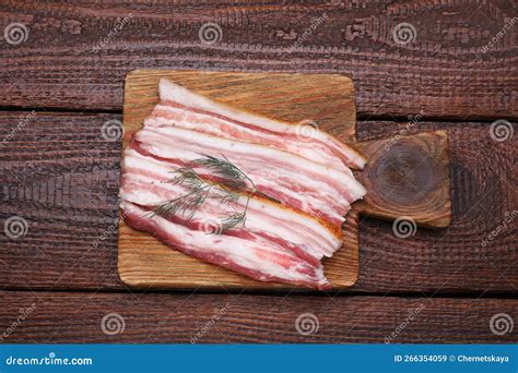 Slices of Tasty Pork Fatback with Dill on Wooden Table, Top View Stock ...
