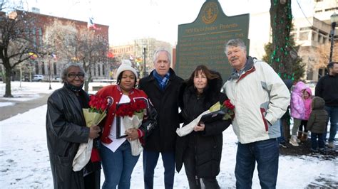 People gather at Breonna Taylors make shift memorial in Injustice Square Park in downtown Louisville