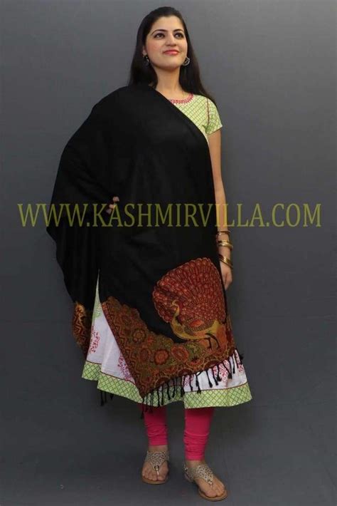 Black colour soft textured wrap with peacock printing on border gains