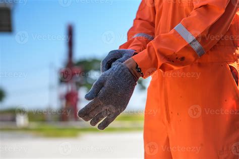 Wearing Construction Safety Gloves Closeup Photo. man wearing safety ...
