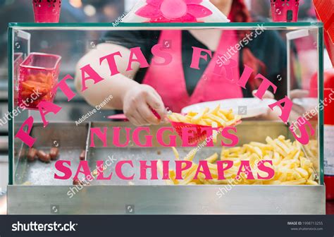 Unrecognizable Person Preparing Typical Spanish Salchipapas Stock Photo ...