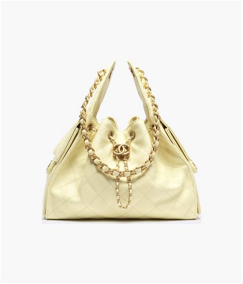 Chanel 25 small handbag, Grained calfskin & gold-tone metal, light ...