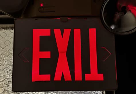 The “T” in this EXIT sign is upside down, somehow. : r/onejob