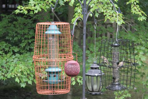 Squirrel pigeon proof bird feeder cages diy using hanging baskets ...