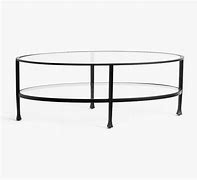 Image result for Oval Glass Spinning Coffee Table
