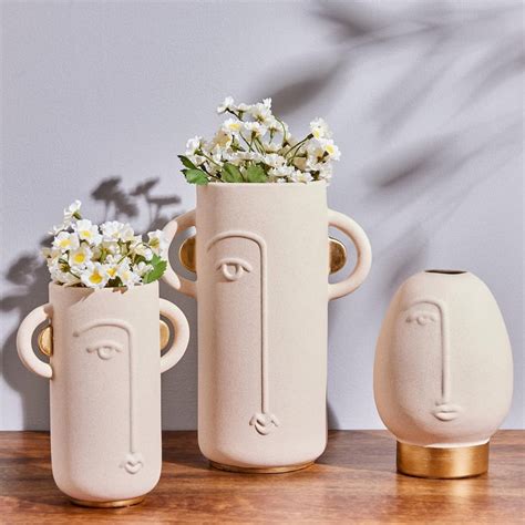 Buy Marshmallow Ceramic Human Face Vase from Home Centre at just INR 1299.0