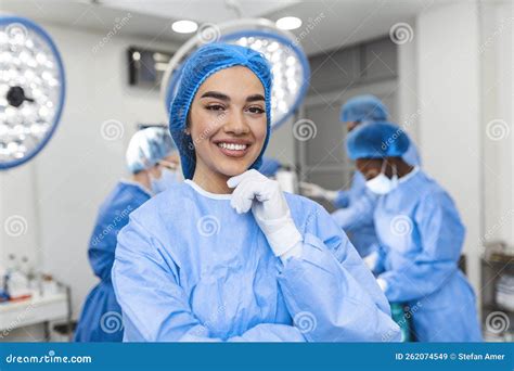 Portrait of Female Woman Nurse Surgeon or Staff Member Dressed in Surgical Scrubs Gown Mask and ...