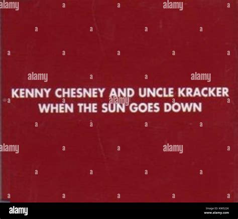 This image features country music artist Kenny Chesney, known for his ...