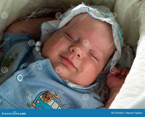 Smiling sleeping baby boy stock photo. Image of home, birth - 2763322