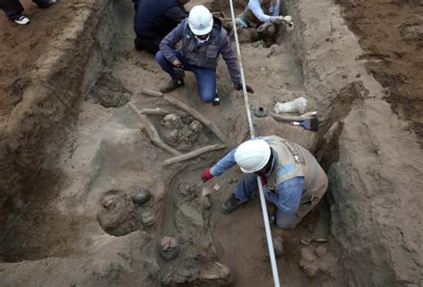 Workers uncover eight mummies and pre-Inca objects while expanding the ...