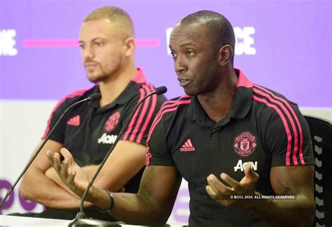 Manchester United players Wes Brown and Dwight Yorke attend a ...