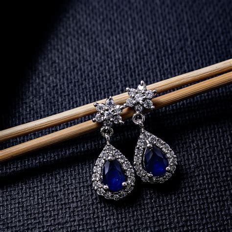 Buy Latest Silver Earrings Online | Blue CZ Danglers | Missori