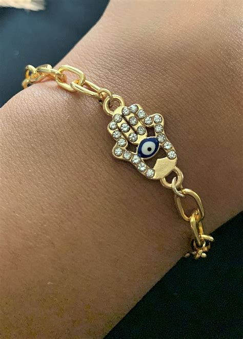 Get Gold-Plated American Diamond Hamsa Bracelet with Chunky Chain at ...