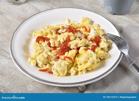 Scrambled Egg Breakfast with Ketchup Stock Photo - Image of plates ...