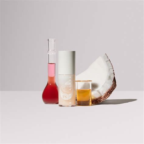 Fenty Treatz Hydrating + Strengthening Lip Oil • Coconut