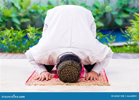 Asian Muslim Man Praying on Carpet Stock Photo - Image of pray, symbol ...