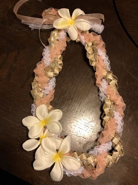 Braided ribbon lei with plumerias | Graduation leis diy ribbons ...