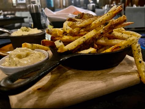 One of my meals at the Four Seasons in Teton Village, Jacksonhole Wyoming: French cut fries with ...