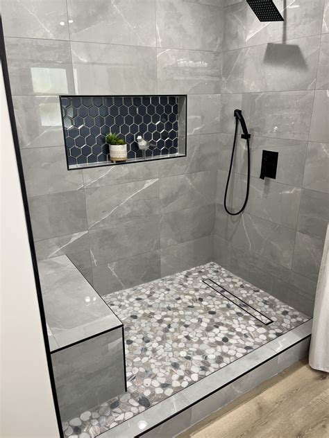 Master Bath Shower with White Curtain and Pebble Floor