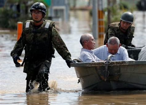 Japan floods: Death toll over 200 as survivors grapple with scorching ...