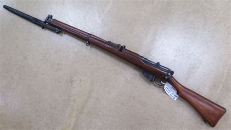 Lot LEE-ENFIELD MK III RIFLE WITH BAYONET, SLING, AND COVER, 40% OFF