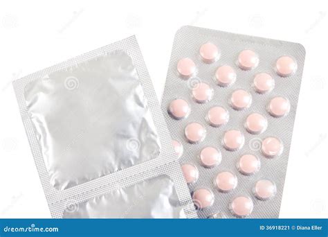 Birth Control Pills and Condoms Over White Stock Image - Image of ...