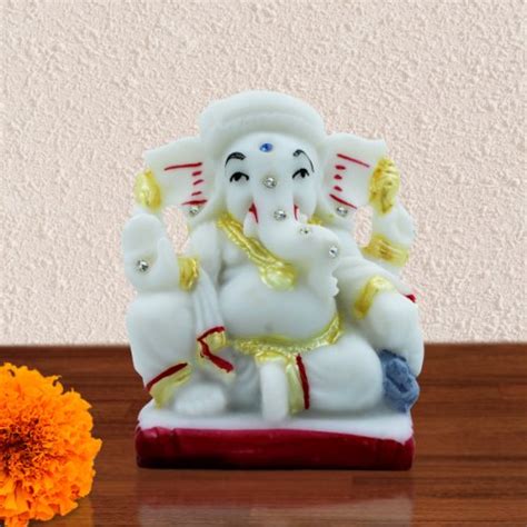 Lord Ganesha Sitting Idol With One Leg Up White Color Best for Home De ...