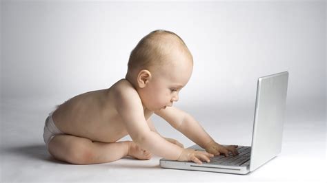 Baby Using Computer 的图像结果