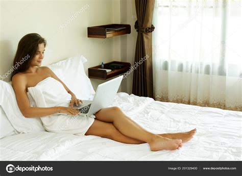 Woman Lying On Bed - Captions Energy