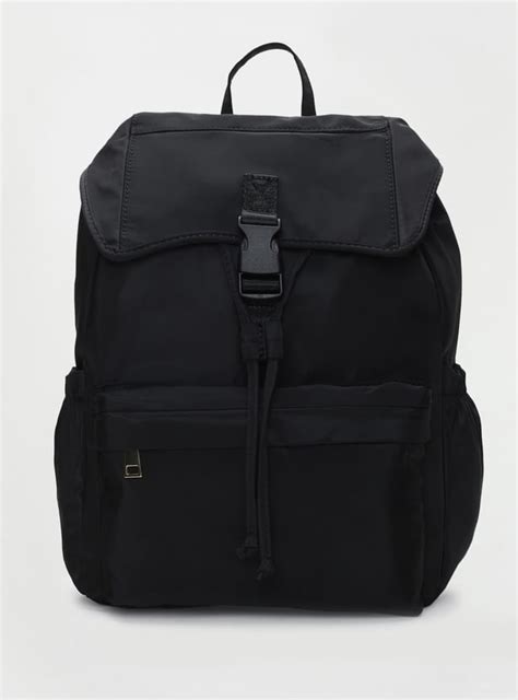 Buy Women Solid Backpack with Flap Online at just Rs. 1499.0 ...