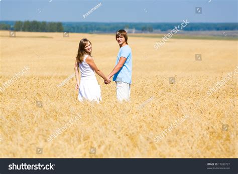 Two People Standing Together 的图像结果