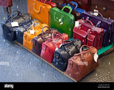 Leather bags for sale in the markets of Florence, Italy Stock Photo - Alamy