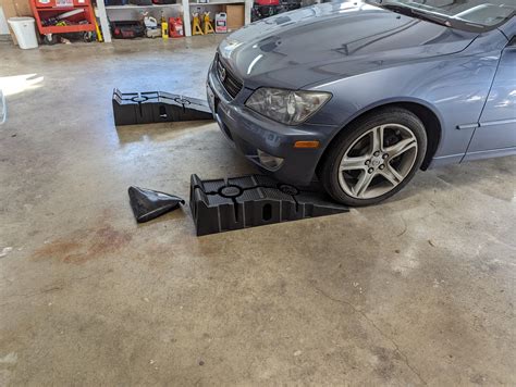 Any ideas for driving up on these ramps? Garage floor is too smooth and they slide forward when ...