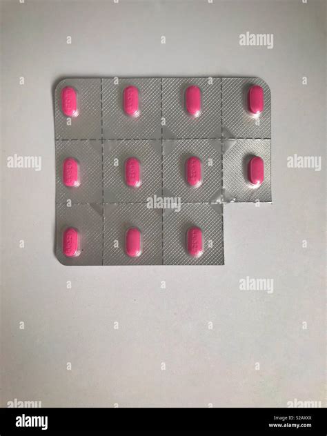 Pink allergy pills Stock Photo - Alamy